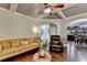 Open-concept living room featuring wood floors and recessed lighting at 2020 Walking Horse Trl, Cumming, GA 30041