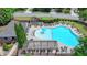 Aerial view of the community pool with plenty of lounge chairs and shade for residents to enjoy at 2020 Walking Horse Trl, Cumming, GA 30041