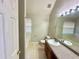 Bathroom featuring a vanity with mirror, toilet, tub and shower combination and natural light at 4610 Idlewood Park, Lithonia, GA 30038