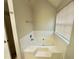 Bathroom featuring a soaking tub, perfect for relaxation and rejuvenation after a long day at 4610 Idlewood Park, Lithonia, GA 30038