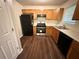Well-equipped kitchen featuring modern stainless steel appliances and ample cabinet storage space at 4610 Idlewood Park, Lithonia, GA 30038