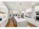 Spacious kitchen with a large island, stainless steel appliances, and ample cabinet space at 505 Woodmoore Ct, Sandy Springs, GA 30342