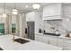 Stylish kitchen with a marble countertop, stainless steel appliances, and pendant lighting at 505 Woodmoore Ct, Sandy Springs, GA 30342