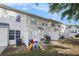 A spacious backyard features a patio area with a play set, offering a great space for relaxation and entertainment at 6962 Gallant Circle Southeast Se Cir # 24, Mableton, GA 30126