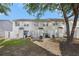 A well-maintained backyard offers a patio, play area with slide, and green lawn for Gathering fun and relaxation at 6962 Gallant Circle Southeast Se Cir # 24, Mableton, GA 30126