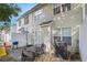 Cozy backyard patio with a basketball hoop, seating area and barbecue grill provides a relaxing outdoor space at 6962 Gallant Circle Southeast Se Cir # 24, Mableton, GA 30126