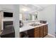 Well-lit kitchen with a breakfast bar open to the adjacent living spaces at 6962 Gallant Circle Southeast Se Cir # 24, Mableton, GA 30126