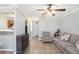 Spacious living room with neutral colors, seamlessly connecting to the kitchen at 6962 Gallant Circle Southeast Se Cir # 24, Mableton, GA 30126