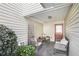 Cozy covered patio with comfortable seating and a privacy screen at 6962 Gallant Circle Southeast Se Cir # 24, Mableton, GA 30126