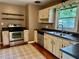 Classic kitchen design with stainless steel appliances and natural light at 1468 Spruce Se Dr, Smyrna, GA 30080