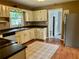 Well-lit kitchen featuring updated stainless steel appliances and ample counter space at 1468 Spruce Se Dr, Smyrna, GA 30080