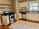 Kitchen features updated appliances, stylish countertops, and plenty of storage at 1468 Spruce Se Dr, Smyrna, GA 30080
