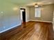 Cozy living room with hardwood floors and a ceiling fan at 1468 Spruce Se Dr, Smyrna, GA 30080