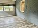 Bright sunroom with brick walls and large windows at 1468 Spruce Se Dr, Smyrna, GA 30080