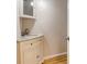 The bathroom features a charming vanity with cabinet storage and attractive fixtures at 1101 White Oak Ave, Atlanta, GA 30310