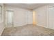 A light-filled bedroom offers neutral walls and soft carpet at 1101 White Oak Ave, Atlanta, GA 30310