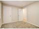 Neutral bedroom with carpeted floors and multiple closets at 1101 White Oak Ave, Atlanta, GA 30310
