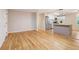 Cozy living room featuring hardwood floors, neutral walls, and access to the kitchen at 1101 White Oak Ave, Atlanta, GA 30310