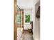 Bright bathroom with glass enclosed tub and natural stone details, creating a spa-like feel at 1164 Bonview Ne Ln, Atlanta, GA 30324