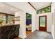 Inviting entrance with natural stone floors, skylights, and wine storage at 1164 Bonview Ne Ln, Atlanta, GA 30324