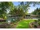 Well-manicured front yard with lush landscaping and a charming exterior at 1164 Bonview Ne Ln, Atlanta, GA 30324