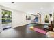 Home gym including basketball arcade game, exercise ball, weights, and a view to the outdoors at 1164 Bonview Ne Ln, Atlanta, GA 30324
