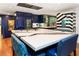 Spacious kitchen island with waterfall countertops and seating for dining at 1164 Bonview Ne Ln, Atlanta, GA 30324