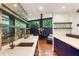 Bright kitchen with modern shelving, marble countertops, and hardwood floors at 1164 Bonview Ne Ln, Atlanta, GA 30324