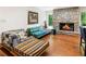 Cozy living area with stone fireplace and comfortable seating at 1164 Bonview Ne Ln, Atlanta, GA 30324