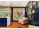 Comfortable living room features colorful artwork and hardwood floors at 1164 Bonview Ne Ln, Atlanta, GA 30324