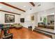 Open concept living room with stone fireplace, hardwood floors, and clerestory windows at 1164 Bonview Ne Ln, Atlanta, GA 30324