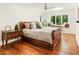 Inviting bedroom with a large window, hardwood floors, and a window seat at 1164 Bonview Ne Ln, Atlanta, GA 30324
