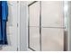 Shower with frosted glass door at 1921 Flint Hill Dr, Lawrenceville, GA 30044