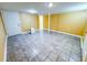 Basement area with tile floor and door, ready for customization to suit your needs at 241 Sarann Nw Ct, Lilburn, GA 30047