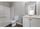 The bathroom features a tub-shower combo and a vanity with ample counter space at 256 Turnstone Rd, Stockbridge, GA 30281