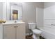 This bathroom has a sink, toilet, and a tub with a shower at 256 Turnstone Rd, Stockbridge, GA 30281