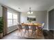 Dining room with modern decor and large window, perfect for Gathering gatherings at 256 Turnstone Rd, Stockbridge, GA 30281