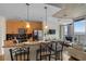 Stylish open kitchen with breakfast bar, granite countertops, and modern appliances at 400 W Peachtree Nw St # 3114, Atlanta, GA 30308