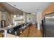 Modern kitchen with stainless appliances, granite countertops, and open concept design at 400 W Peachtree Nw St # 3114, Atlanta, GA 30308
