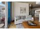 Stylish living room with plush seating, balcony access, and a modern aesthetic at 400 W Peachtree Nw St # 3114, Atlanta, GA 30308
