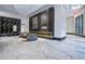 Spacious lobby featuring geometric wall decor, a fireplace, and large windows at 400 W Peachtree Nw St # 3114, Atlanta, GA 30308