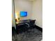 Individual work station with computer monitor, desk, chair and task lighting at 400 W Peachtree Nw St # 3114, Atlanta, GA 30308
