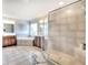 Luxurious bathroom featuring dual vanities, a soaking tub, and a separate glass-enclosed shower for ultimate relaxation at 122 White Spruce Ct, Dallas, GA 30157