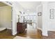 Elegant entryway with hardwood floors and a view into the living room at 122 White Spruce Ct, Dallas, GA 30157