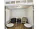 Cozy office space with a comfortable armchair and natural light at 122 White Spruce Ct, Dallas, GA 30157