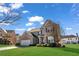 Charming two-story brick home with a well-manicured lawn and two car garage at 2468 Cannon Farm Ln, Duluth, GA 30097