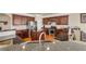 Beautiful kitchen features stainless steel appliances and dark granite countertops and rich wood cabinets at 2468 Cannon Farm Ln, Duluth, GA 30097