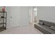 Flex space featuring doorways to a closet and bathroom, neutral paint and carpet at 370 Cassidy Trl, Douglasville, GA 30134