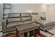Comfortable gray couch with throw pillows and a dark coffee table in the living area at 370 Cassidy Trl, Douglasville, GA 30134