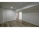 Unfinished basement showcasing wood-look floors and neutral paint at 515 Allens Landing Ct, Lawrenceville, GA 30045